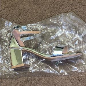 Metallic silver square heels. Size 6.5.